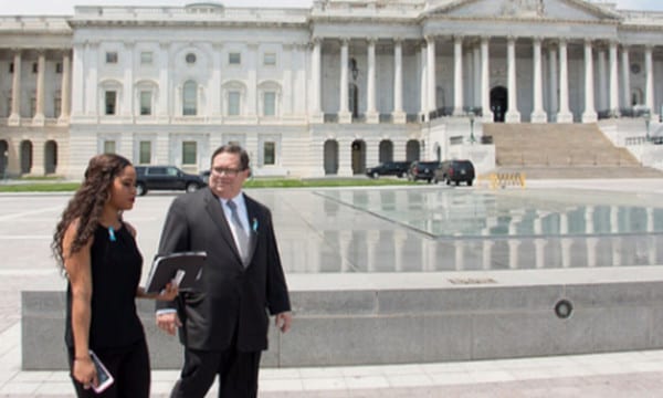 Student Walks with Rep. Farenthold in Front of the Capitol Building on Shadow Day (1)