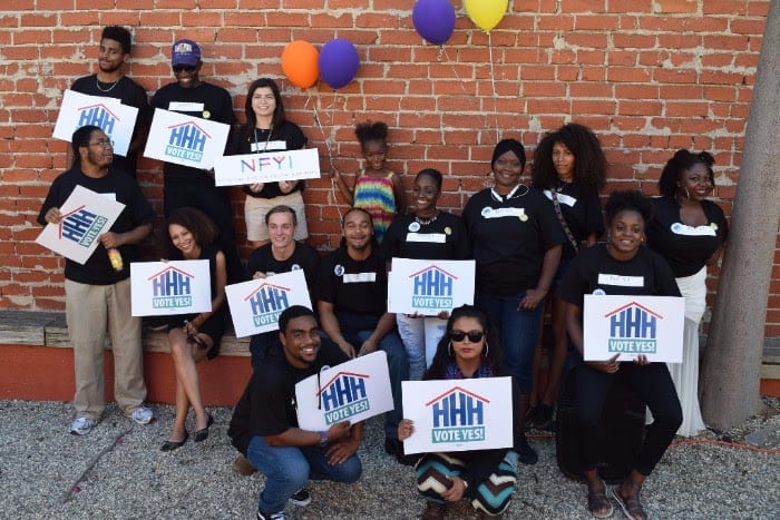 3-nfyi-youths-holding-up-prop-hhh-signs